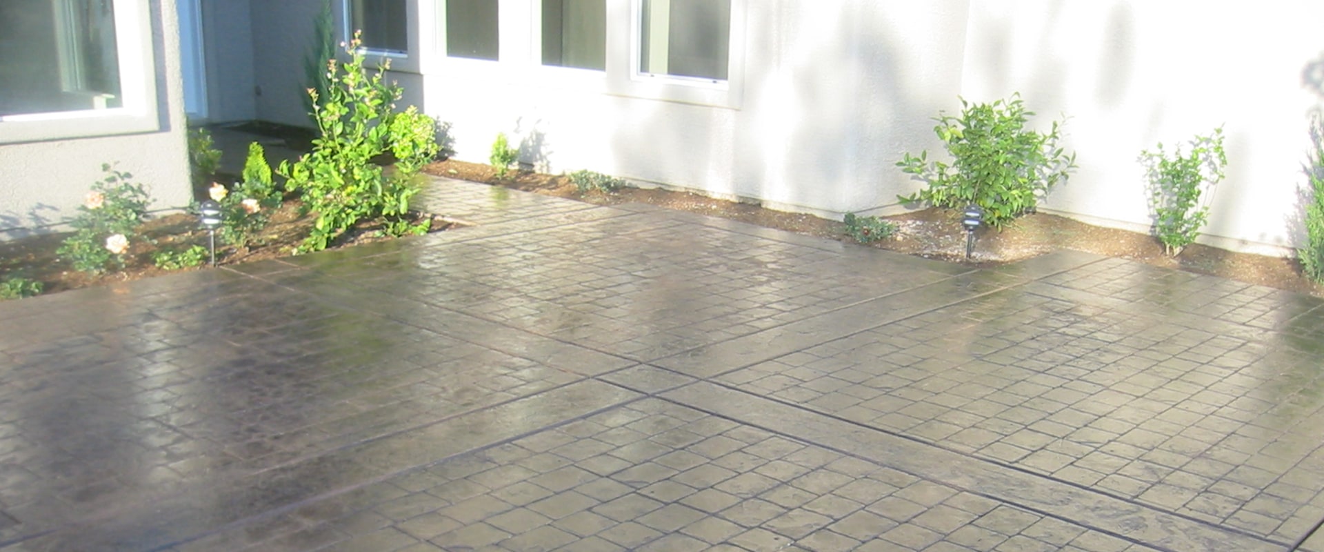 How long does a stamped concrete overlay last?
