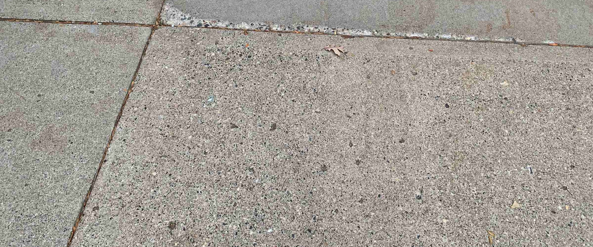 Is it better to resurface or replace driveway?